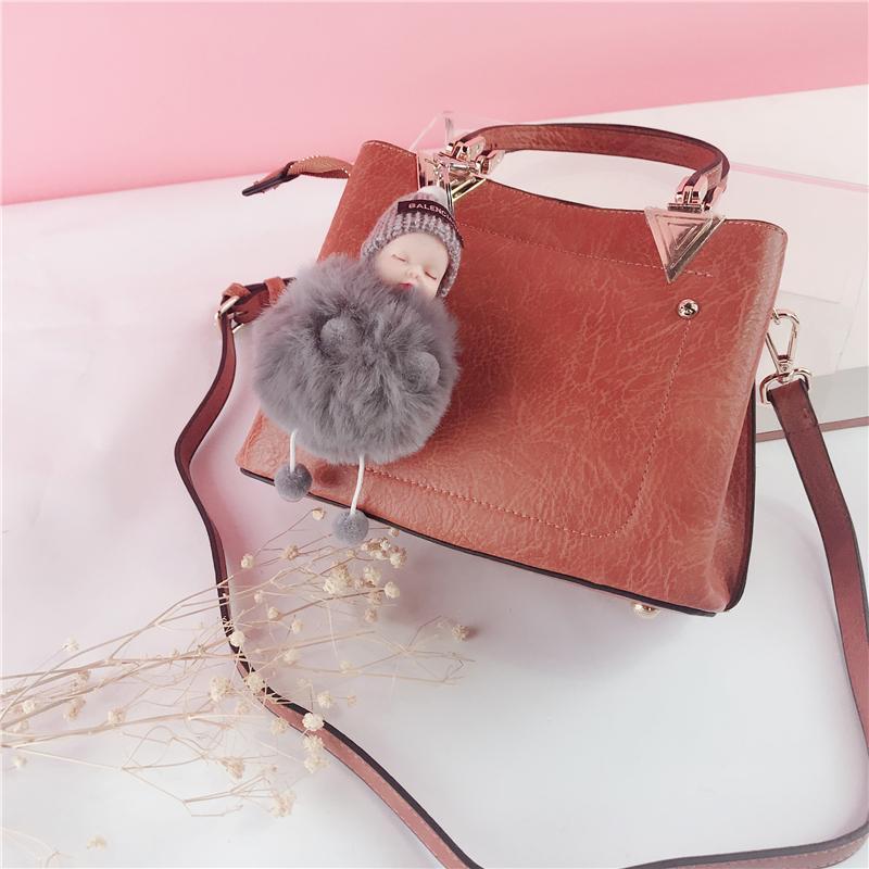 Niedliche Simulations-Plüsch-Schielpuppe – Bild 4