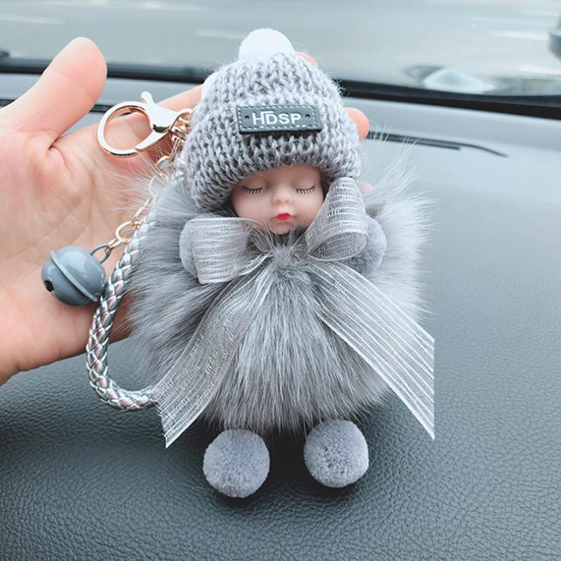 Niedliche Simulations-Plüsch-Schielpuppe – Bild 2